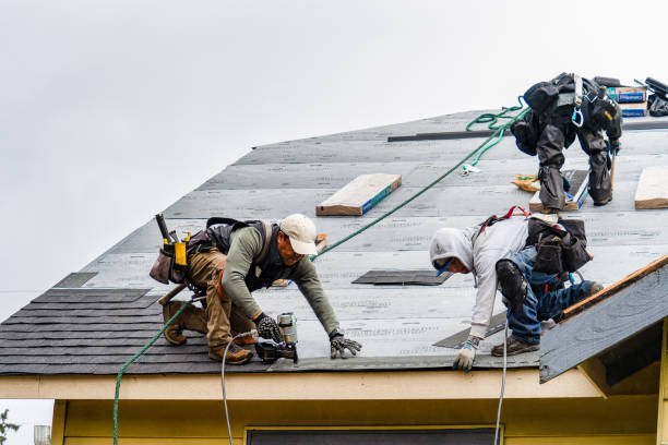 Professional Gutter Installation technician working in Spearville, KS